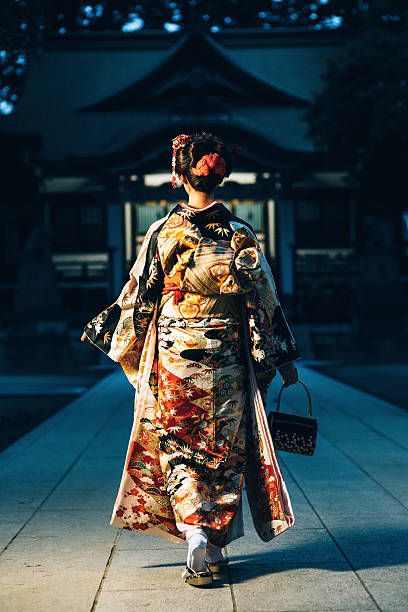 istock Japonese woman walk to the temple 476889072