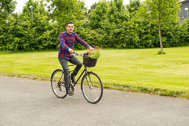 istock Gardener arriving at his allotment by bicycle 476889134