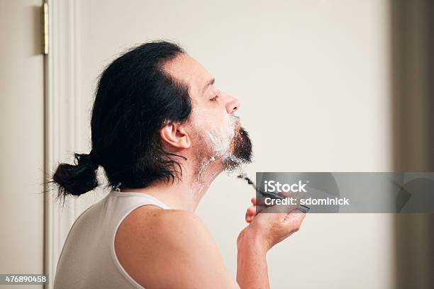 Man Shaving Beard Stock Photo - Download Image Now - Shaving, 2015, 40-44 Years