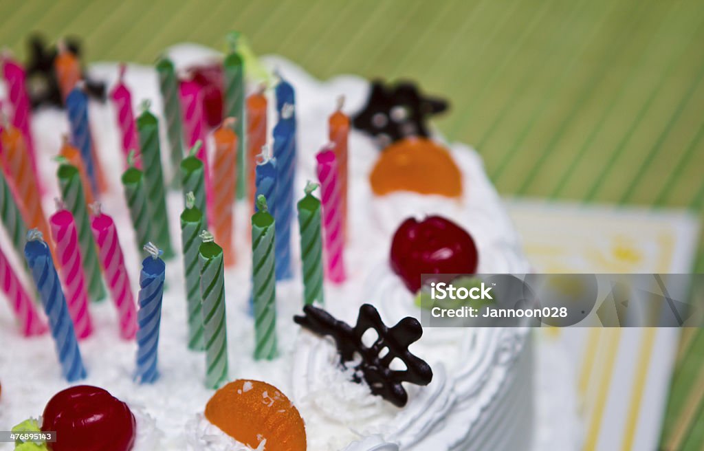 White Cream Cake with Fruits and Chocolate Backgrounds Stock Photo