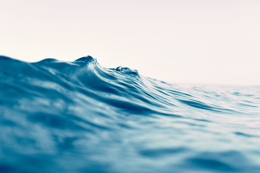 Water surface close-up. Low angle view, shallow DOF