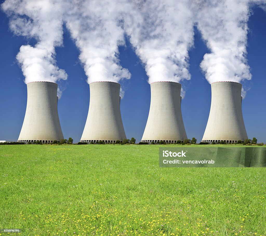 Nuclear power plant The smoking chimneys of the nuclear power plant Air Pollution Stock Photo