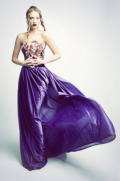 istock Young woman in the wind. 476896225