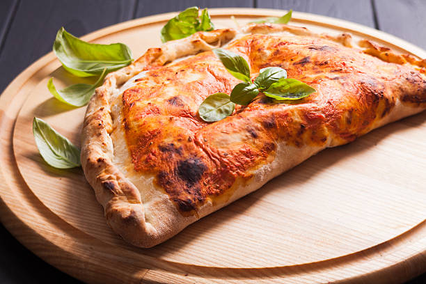 Pizza calzone stock photo
