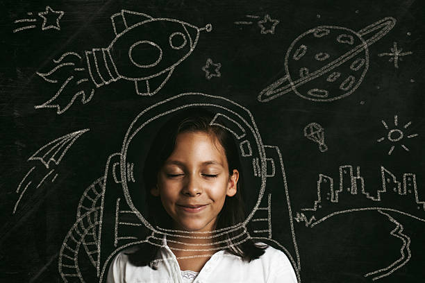 aspiracje aby być astronauta - child thinking school education zdjęcia i obrazy z banku zdjęć