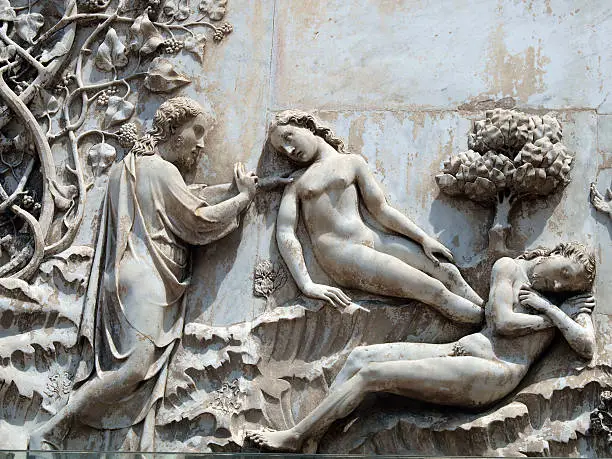 Orvieto - Duomo facade. The first pillar: scenes from Genesis. Creating Eve .