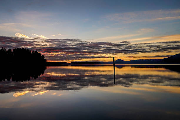 istock dec 25 sunset at Lake Quinault, Wa 476901447