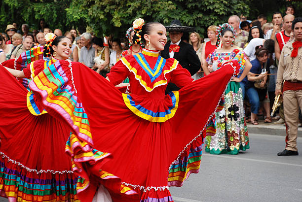 Veliko Tarnovo, Bulgaria - July 19, 2008: Beautiful mexican girl in Veliko Tarnovo. Mexican woman in traditional costume plays traditional dance on \
