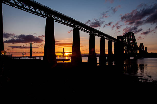 istock Forth Rail Bridge Silhouette against the sky and sunset 476905892