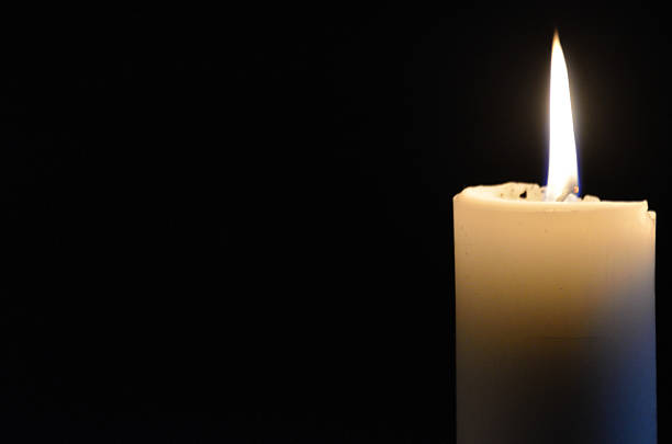 istock Candle in church 476909828