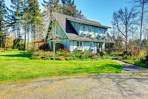 istock Beautiful farmhouse with open deck and charming flowerbed 476910447