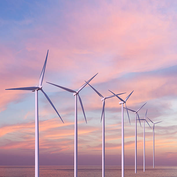 istock Wind generators turbines in the sea on sunset 476911077