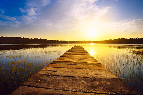 Sunset over the lake with a pier in Guatemala