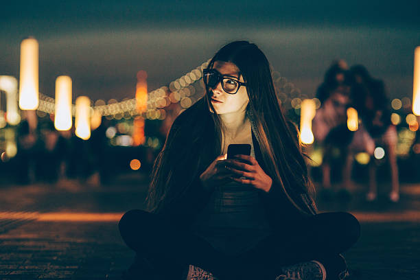 istock Young woman texting on the phone 476915046