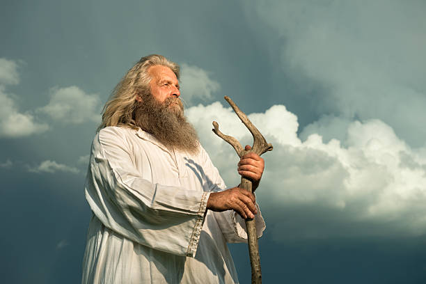 istock long-haired prophet standing in front of dramatic sky 476915180