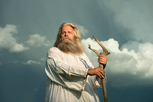 istock long-haired prophet standing in front of dramatic sky 476915184