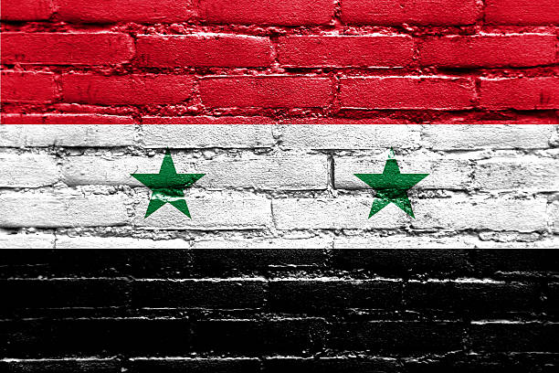istock Syria Flag painted on brick wall 476915603