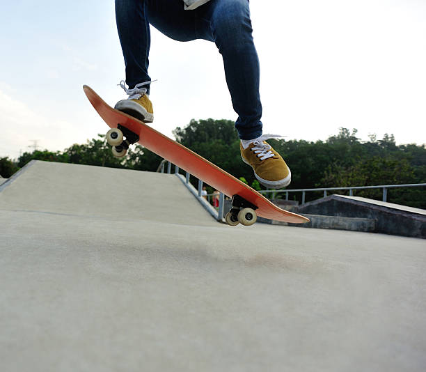 istock skateboarding legs sunrise skatepark 476920862