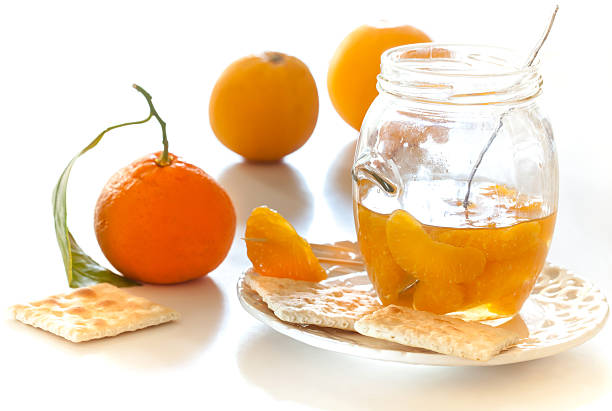 peeled tangerine slices on a cookie stock photo