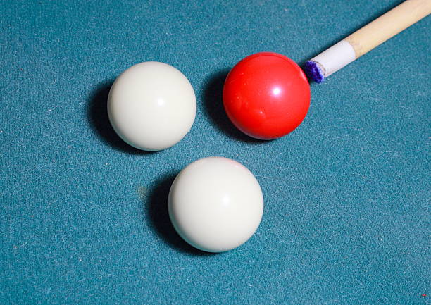 istock Carambole billiards with cue on blue cloth 476924965