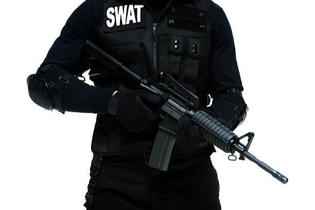 istock Police holding rifle 476928222