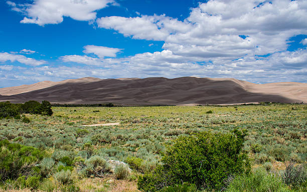 istock Great Sand Dunes with big Shadow over the Dunes 476928444