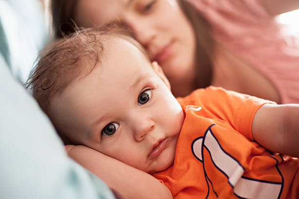Just Awaken Baby Boy Mom In Bed