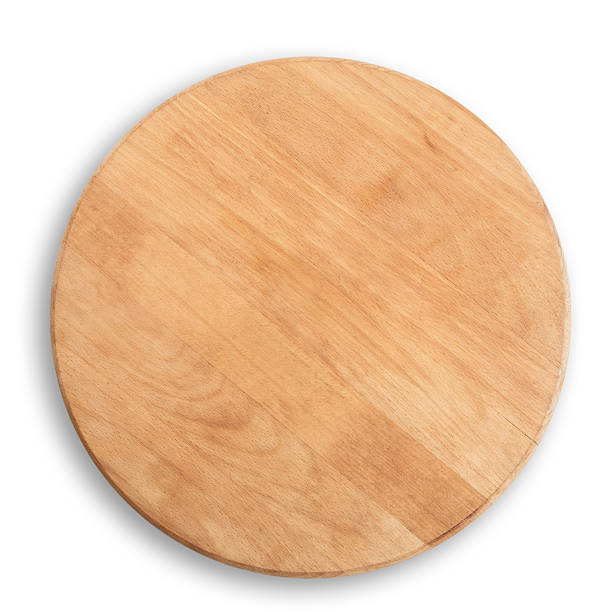 istock Wooden round board for pizza 476936494