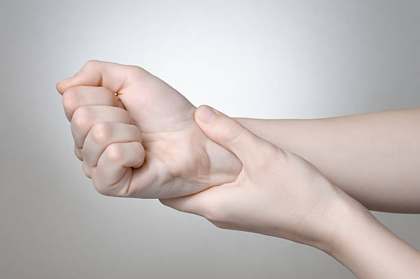 istock Woman with painful wrist 476940843