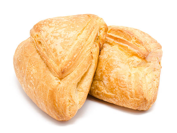 istock Two fresh puff pastry isolated on a white 476941804