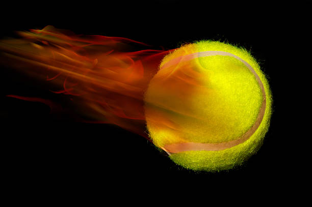 istock Tennis Ball on Fire. 476944915