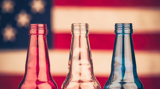 Patriotic red, white and blue beer bottles. July 4th party.