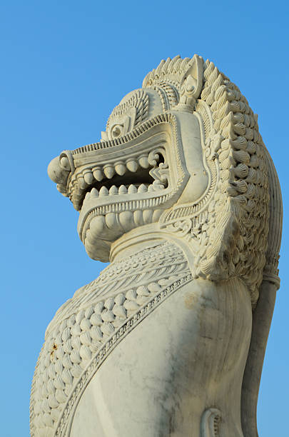 istock Lion Sculpture at a buddist temple in Thailand 476947527