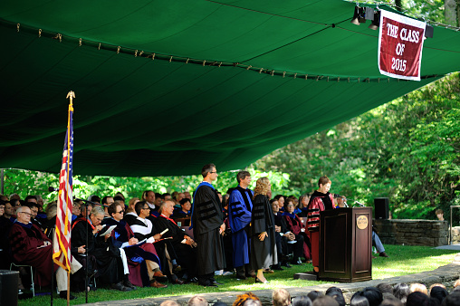 Swarthmore, USA - May 31, 2015. Interim President Constance Cain Hungerford making a speech on Commencement day at Swarthmore College Amphitheater. Swarthmore College is a top ranking private liberal arts college founded in 1864. It has a total enrollment of less than 1,600 students with a garden like campus located in Swarthmore, about 11 miles southwest of Philadelphia in the State of Pennsylvania.