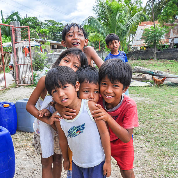 Smiling, Happy Children Pose for Picture - Cebu, Philippines stock photo