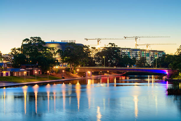 istock SAHMRI and NewRAH at dusk by Torrens River. 476953500