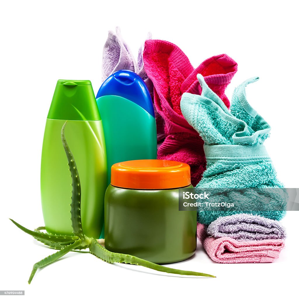 Body Care. Shampoo, soap, conditioner and towels stacked. Body Care. Shampoo, soap, conditioner and towels stacked isolated on a white background. 2015 Stock Photo