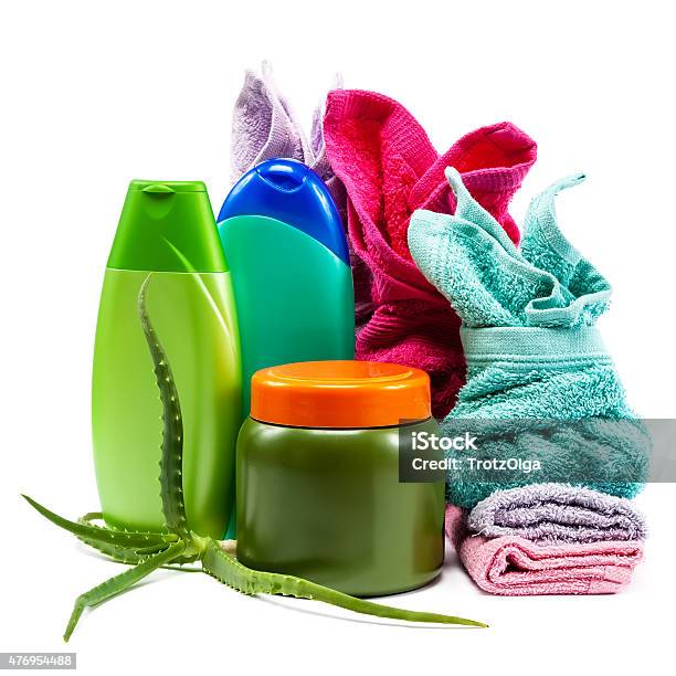 Body Care Shampoo Soap Conditioner And Towels Stacked Stock Photo - Download Image Now