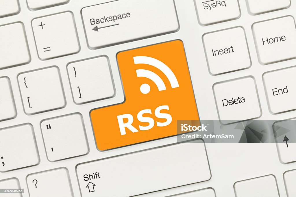 White conceptual keyboard - RSS (key with logotype) Close-up view on white conceptual keyboard - RSS (key with logotype) 2015 Stock Photo