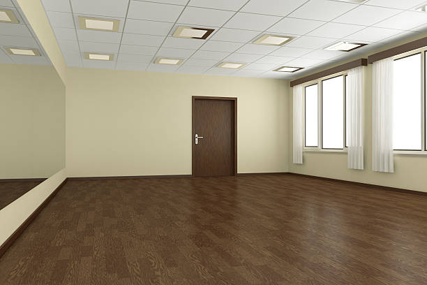 istock Empty training dance-hall with yellow walls and dark wooden floo 476961994