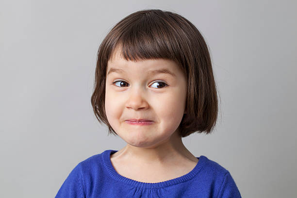 istock 3-year old child having fun in expressing herself 476963342