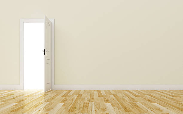 istock Opened White Door on brown Wall, Wood Floor 476964380