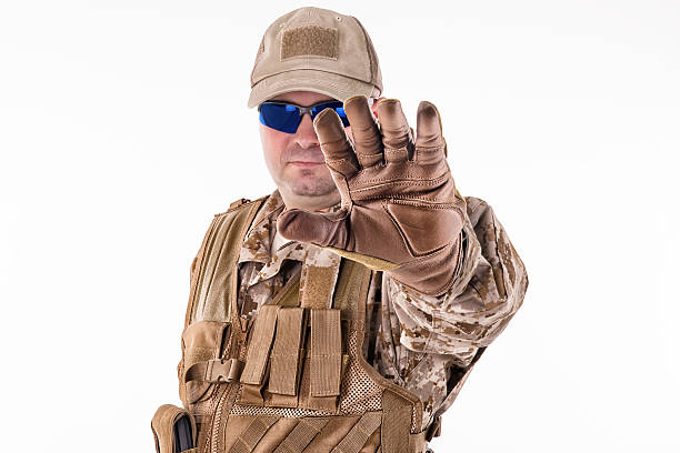 istock Military man showing stop gesture 476965082