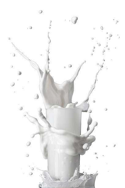 istock milk splash in glass isolated on white 476965987