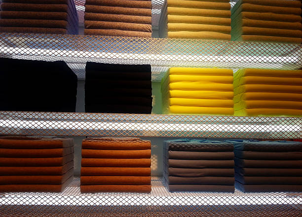 Clothes packed and arranged on the shelf