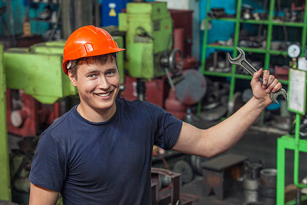 istock The young man working at the old factory on installation 476968562