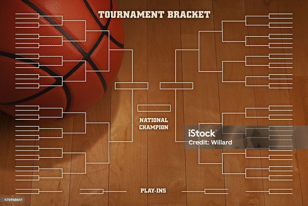 Basketball tournament bracket with spot lighting on wood gym floor Basketball tournament bracket over image of ball with spot lighting on wood gym floor Sports Bracket Stock Photo