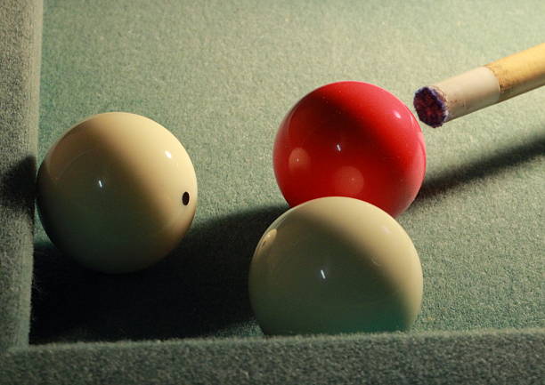 istock Carmbole billiards in the corner with worn cloth 476971583