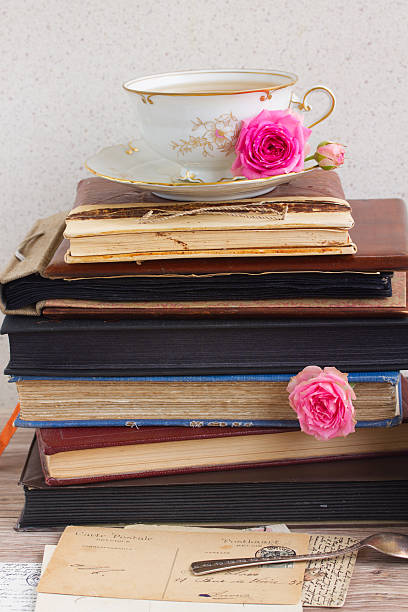 istock books  with cup of tea 476971836