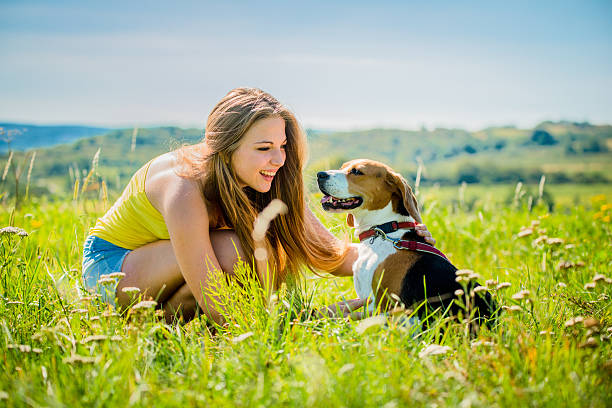 istock Teenager with her dog 476972307